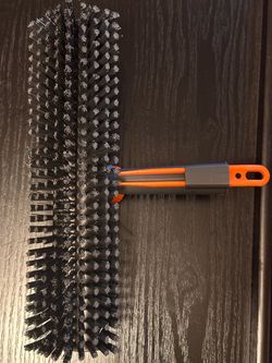 Broom head with cleaner tool