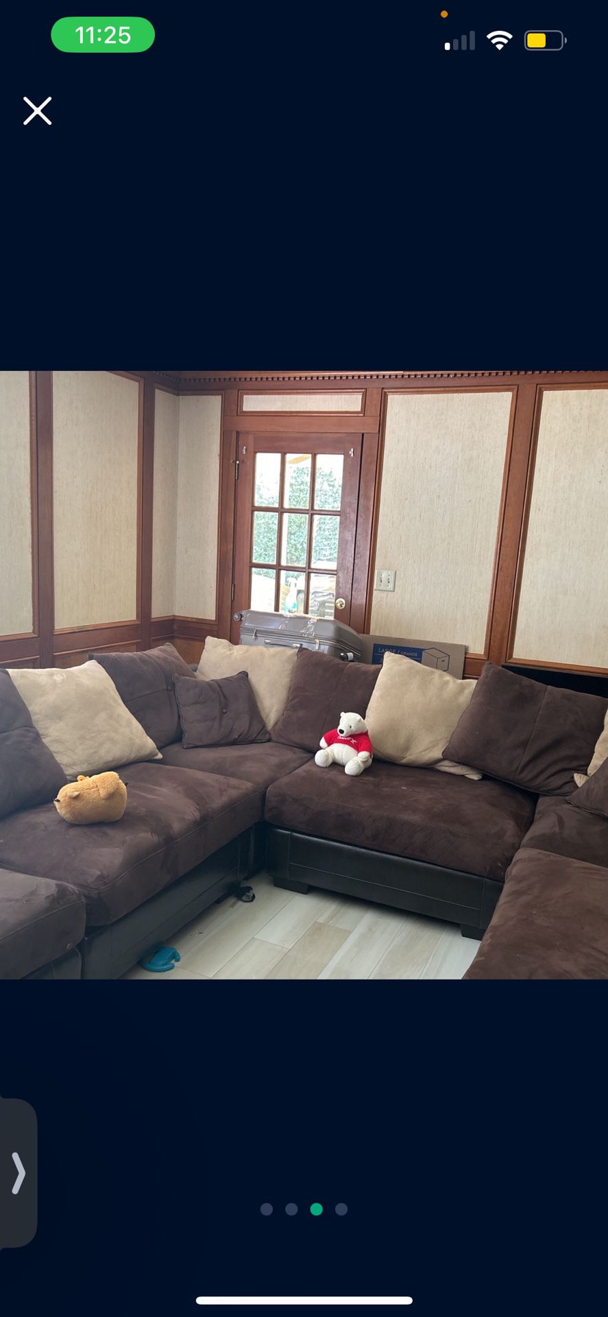 brown sectional sofa with 12 full pillows and 2 minis