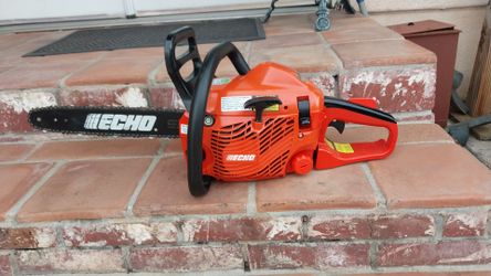 CHAINSAW EXCHO  14" IN EXCELLENT CONDITION ONLY USWD ONCE