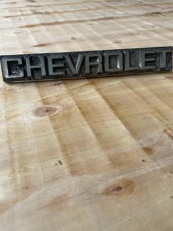 Caprice Classic CHEVROLET grill emblem.
