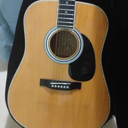 Acoustical Guitar With Pearl Inlay