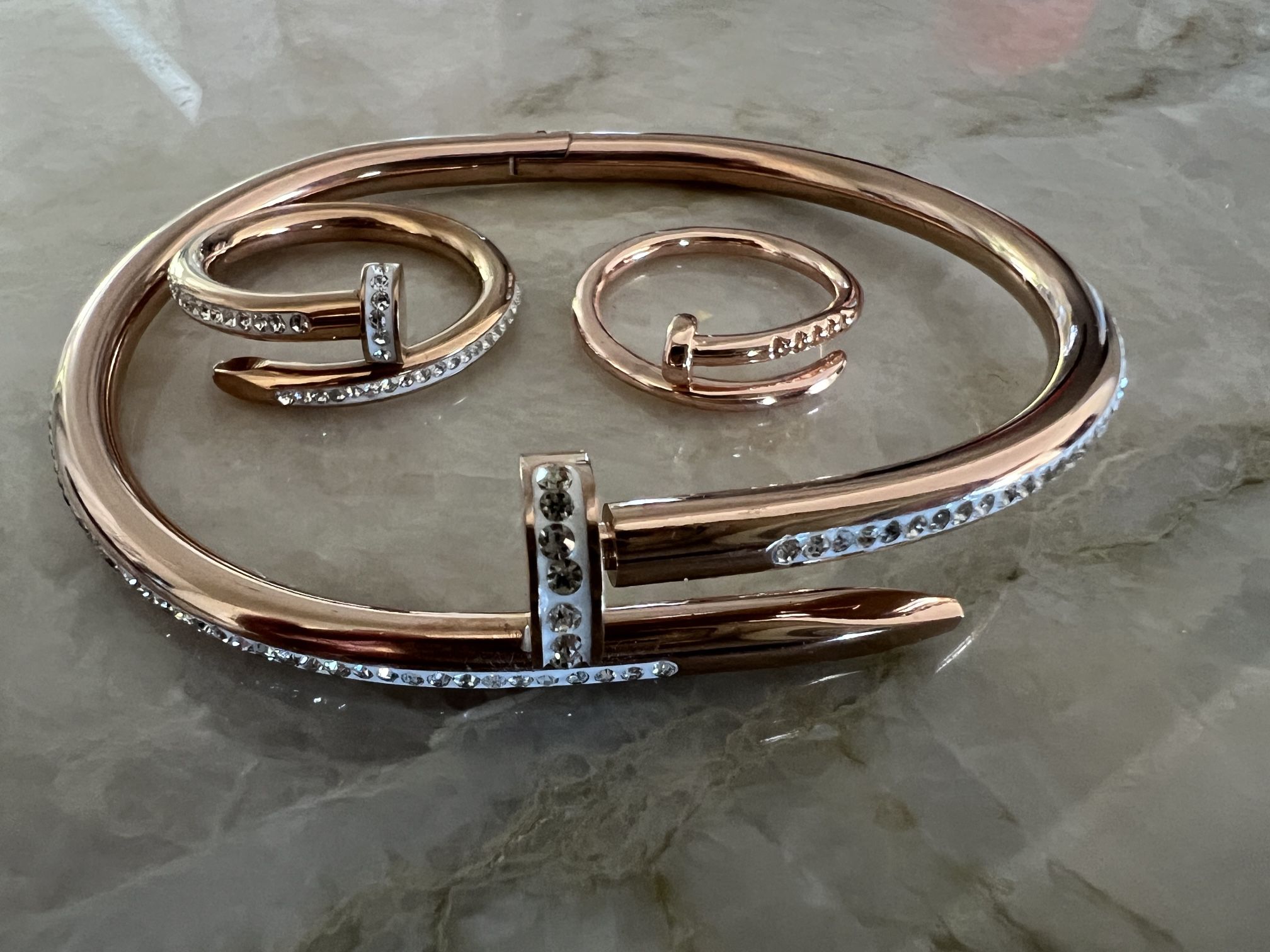 Nail Bracelet and rings. Cartier dupe.