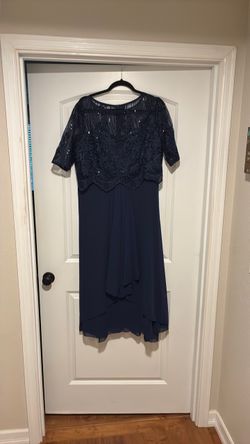 2 new dresses in navy blue sizes in extra large and 10 to nobody12