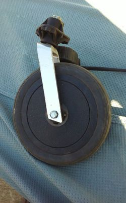 Plastic wheels and and brackets 1 in x 9 1/2 tall $15for four