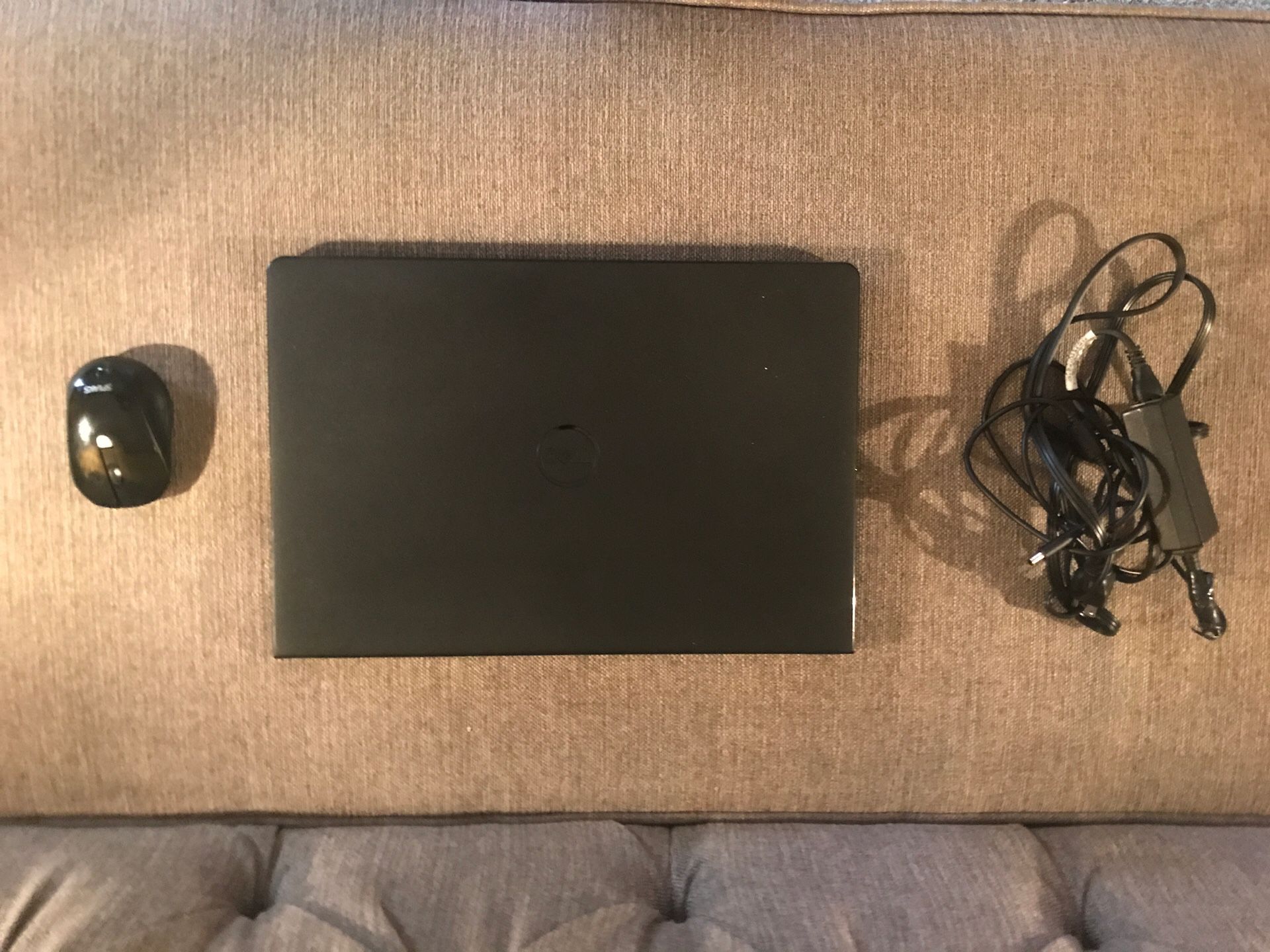 Dell Inspiron 15. With charger and mouse.
