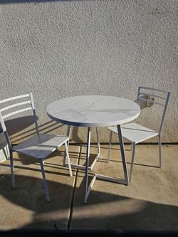 Table and two chairs
