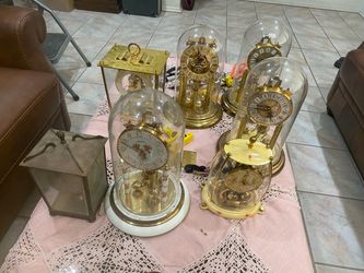Lots of 7 vintage dome clocks all need suspension spring