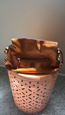Dooney & Bourke Florentine leather hobo handbag in natural brown.