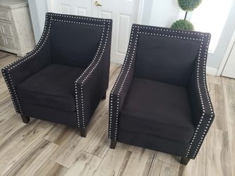 Two black accent chairs