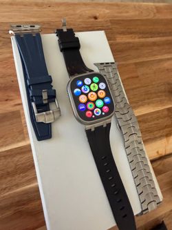 Apple Watch Ultra 1 with extra bands and bracelet