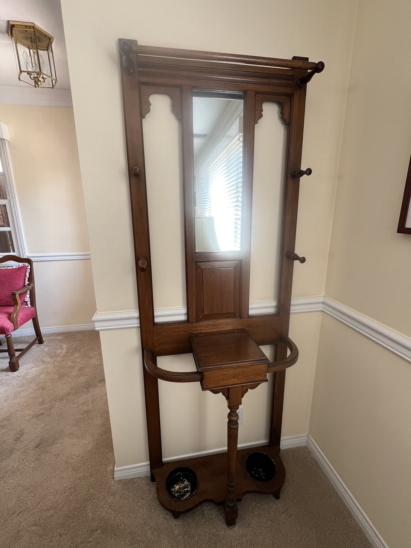 Antique or vintage hall tree umbrella stand with mirror