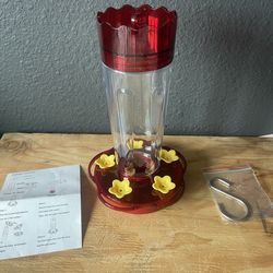 New humming bird feeder, plastic, $5