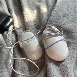 Two Apple Mouses