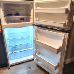 27" W x 60" H - One y/o, dorm refrigerator
