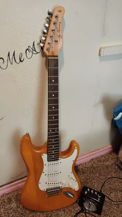 Semi new guitar with amp