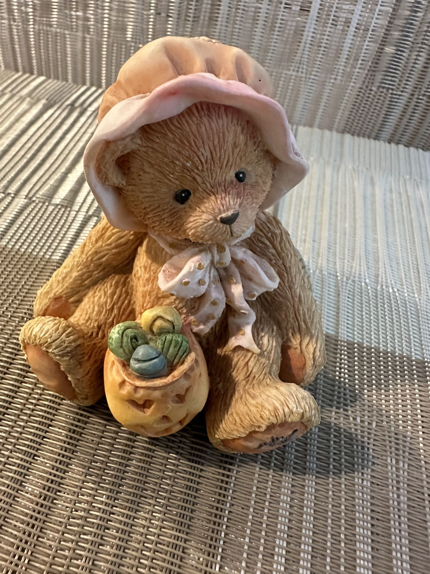 This figurine is a vintage Cherished Teddies "Phoebe" - February Bear