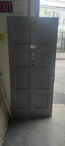 Exterior solid wood single door with door knocker and peep sight 36x80