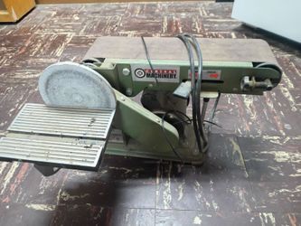 Small table sander with side wheel