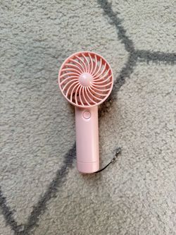 light pink portable rechargeable fan keychain, gently used