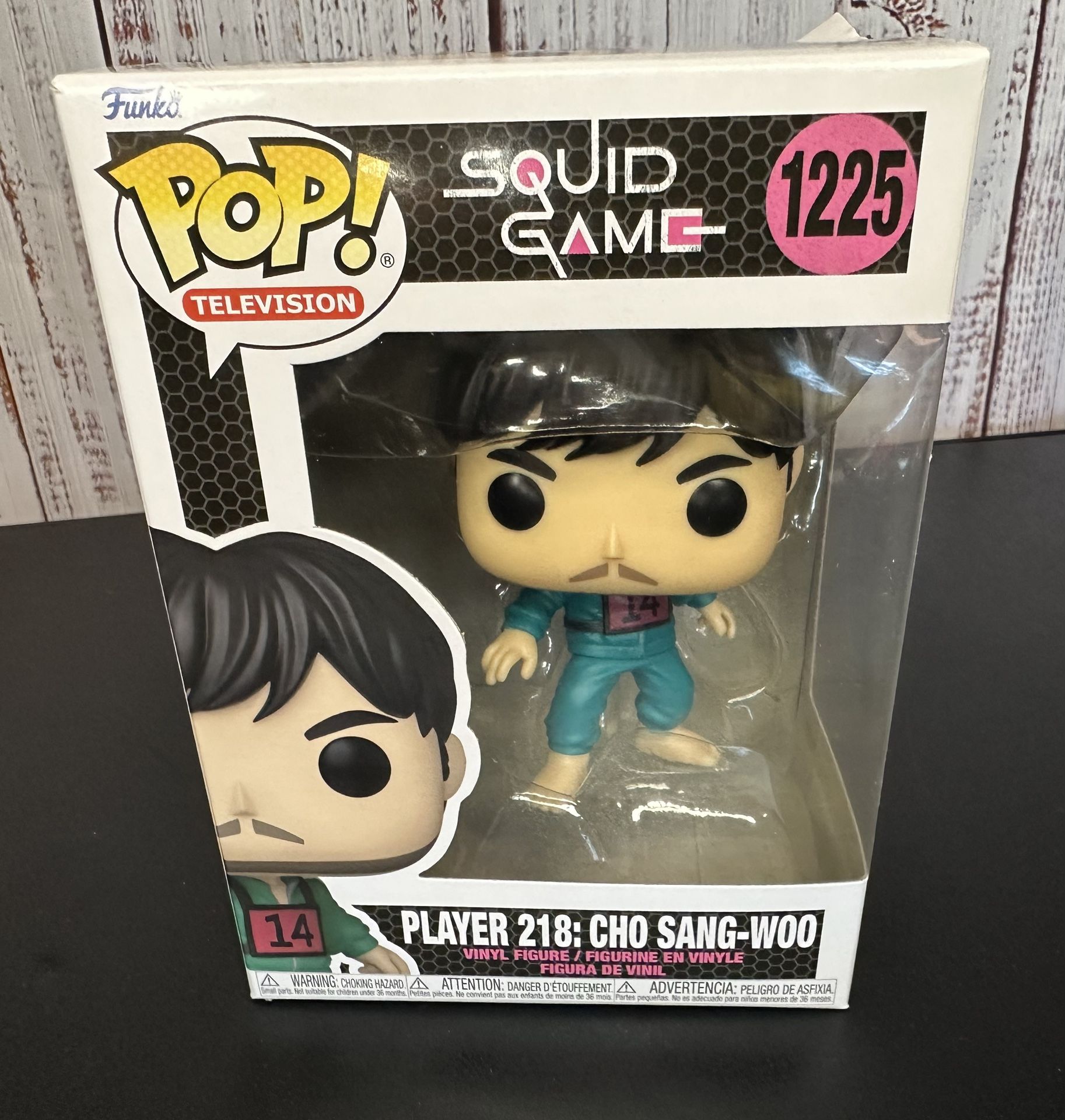 Funko Pop television Squid Games 1225 Player 218: Cho Sang-Woo. New but box has a corner lifted on top.