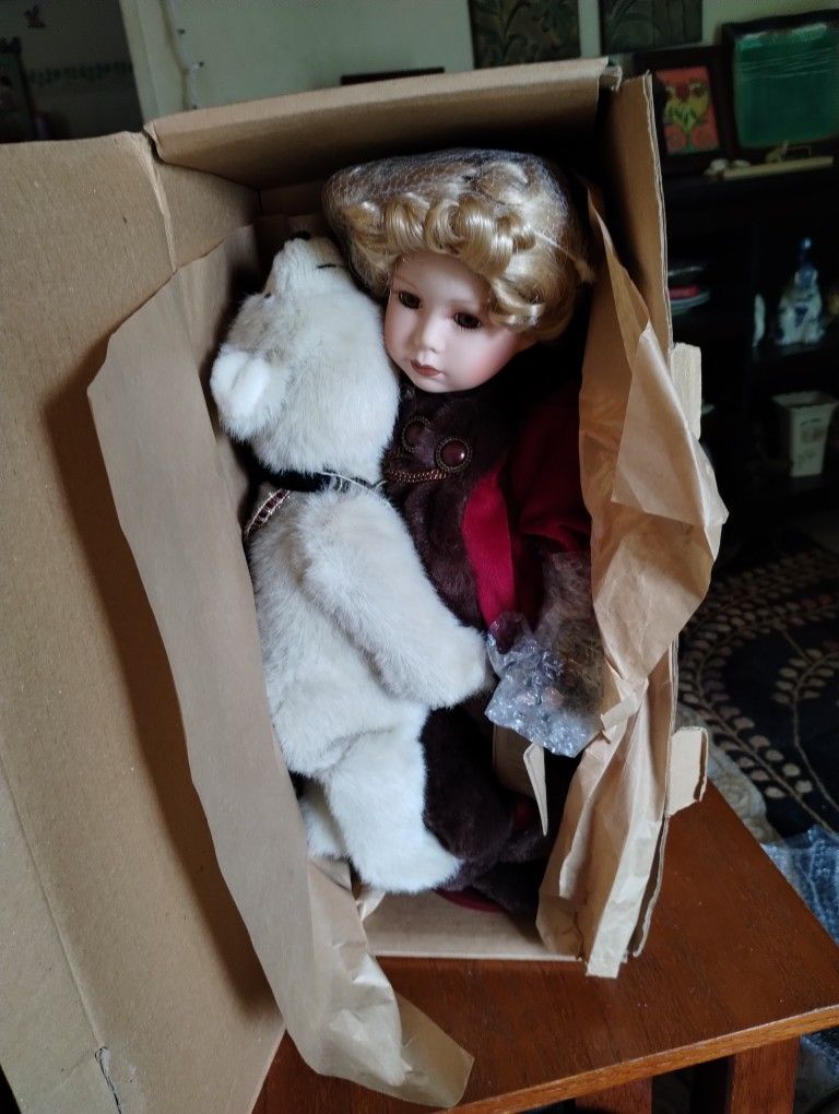 Porcelain Doll  With A Bear 25.00