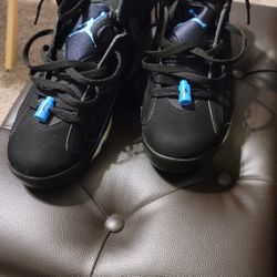 2017 Black and Carolina blue Jordan 6's 