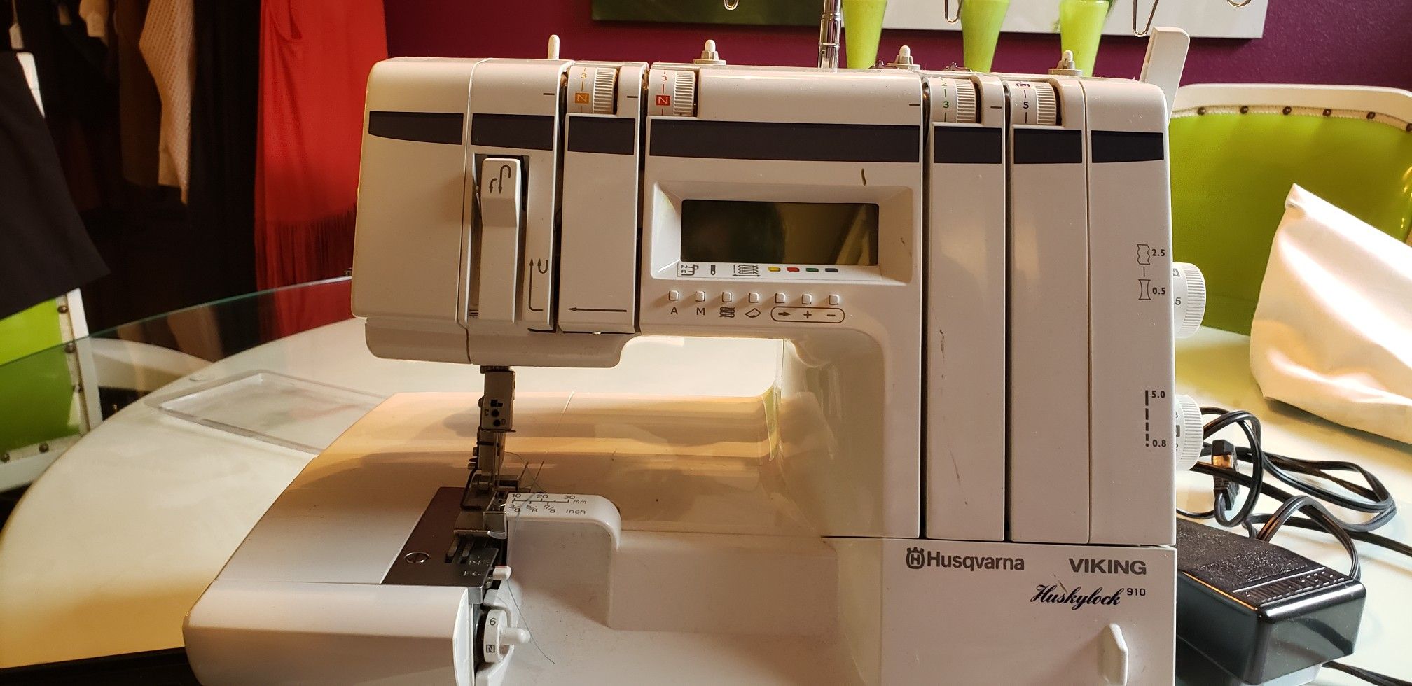 Husqvarna 910 Serger with extra feet, book and thread. for Sale in