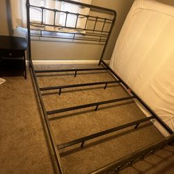 Moving Sale- Rod iron Queen Bedframe