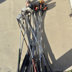 Assortment of Golf Clubs 