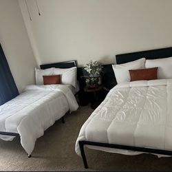 Two Twin Bed frames and Two Twin Foam Mattress