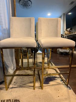 2 high suede beige chairs