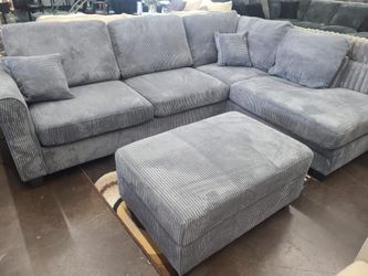 Gray Corduroy Sectional with storage ottoman