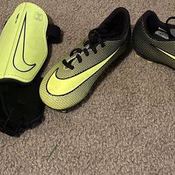 Youth Nike Soccer cleats and shin guards