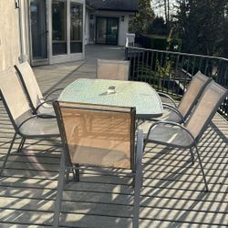 Patio Table And Six Chairs. - Lightweight - Stackable Chairs