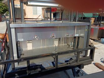 Electric steam table with signage