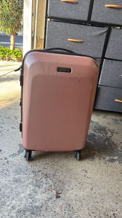 American Tourister Pink Carry on suitcase