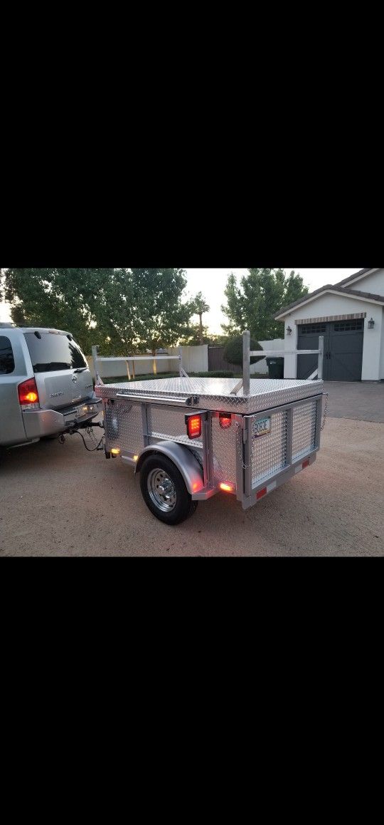 Custom Camping Trailer For Camping Gear With Kayak Rack And Removable Top . With Night Time Led Flood Light Stand For Night Set Up .