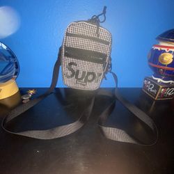 the Supreme 3M Reflective Grid Shoulder Bag 
