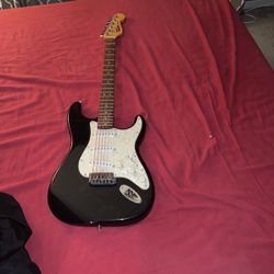 Squier Strat By Fender