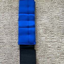 Adjustable blue weighted ankle weight for workouts