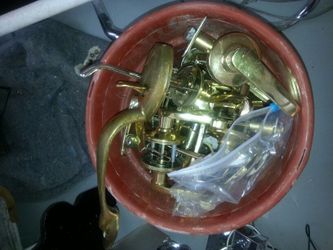 Brass handles with screws in all in a box