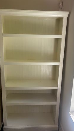 tall beige bookcase