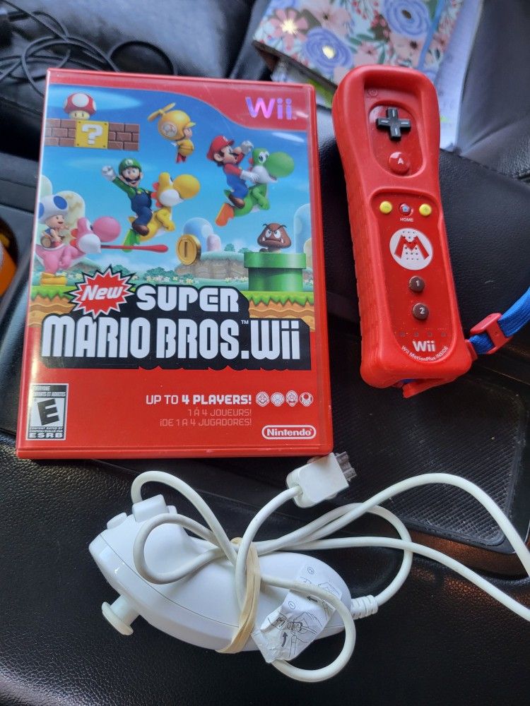 Nintendo wii Motion plus mario remote With Cover
New Super Mario game
And nunchuck controller