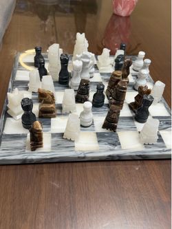 Carved granite onyx board with Vintage Carved Stone Chess Set: Aztec Mythological Figurines