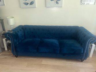 Three piece blue velvet couch set