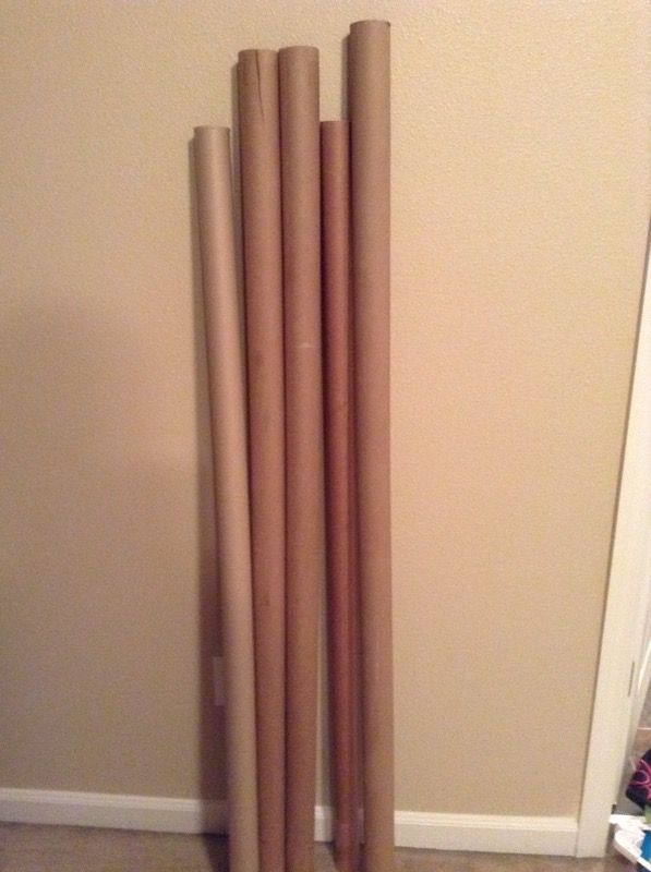 Empty fabric rolls/ cardboard tubes