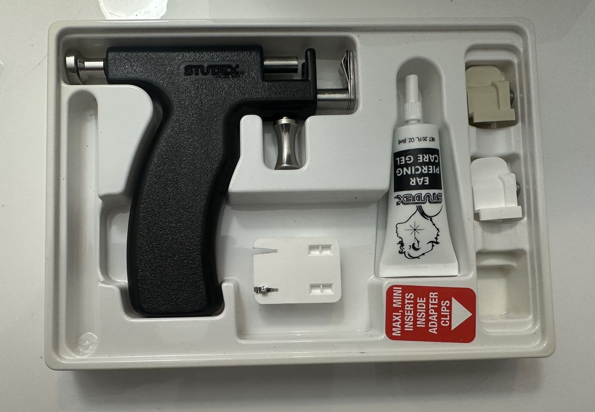 ear piercing gun, ear piercing tool