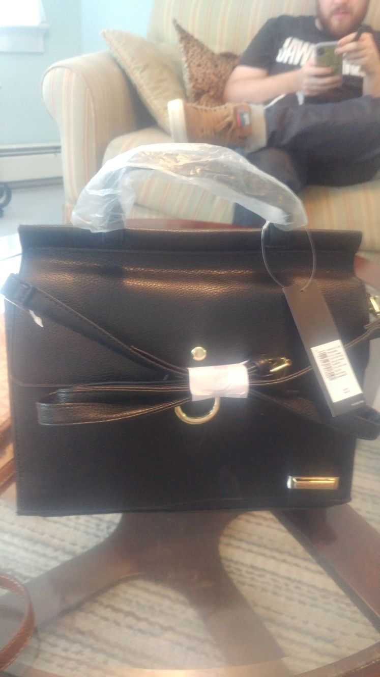 Brand new Tahari black leather Asking $75 or