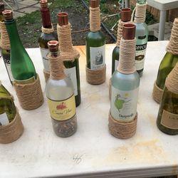 Wine bottle candle stick holders $5 each