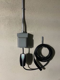 EV charger car charger Tesla wall connector Nema 1450 outlet
